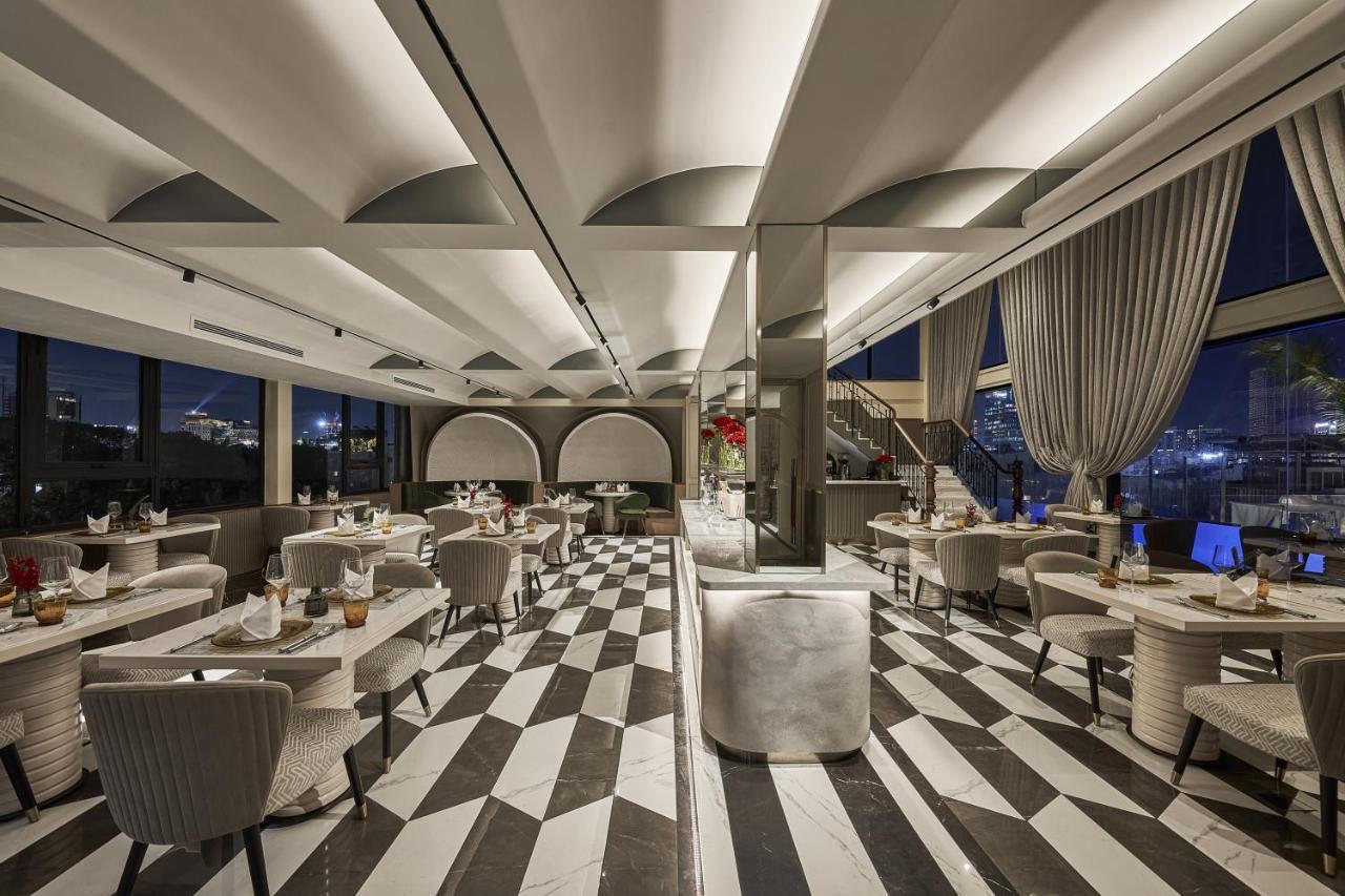 La Siesta Premium Saigon Hotel Ho Chi Minh City Bagian luar foto The interior of the restaurant