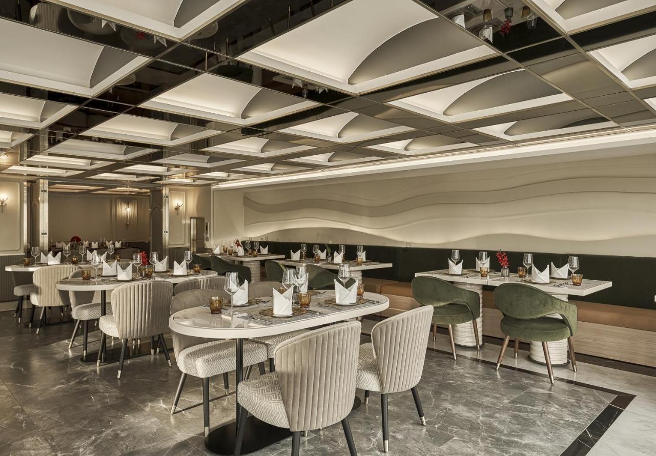 La Siesta Premium Saigon Hotel Ho Chi Minh City Bagian luar foto The interior of the restaurant