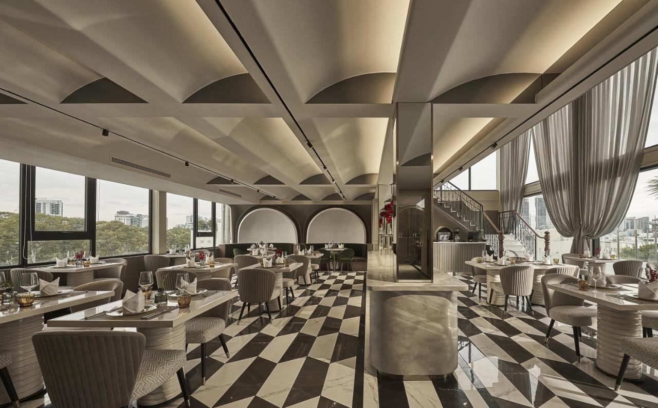 La Siesta Premium Saigon Hotel Ho Chi Minh City Bagian luar foto The interior of the restaurant