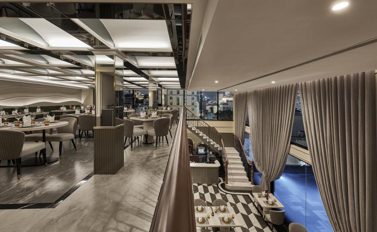 La Siesta Premium Saigon Hotel Ho Chi Minh City Bagian luar foto The interior of the restaurant